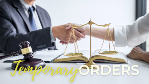 Lawyer and client shaking hands over a table, with the scales of justice and a gavel visible in the background, symbolizing legal agreement and partnership